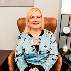 Photo of Angela Noll, M.A., PLPC, Therapist in St. Louis at Marble Wellness.