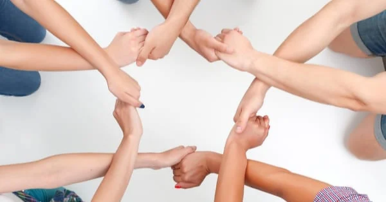 A group of people holding hands showing support. Having good mental health, means having a good support system. Marble Wellness Chicago is here for you. Marble Wellness can be your support and part of your current support system. Marble Wellness offers counseling services both in person or virtually. 