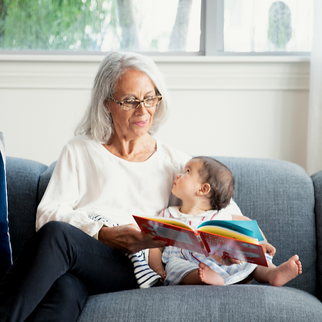 A grandma reading to her grandchild. using your family for help is crucial when being a mom. Motherhood can be overwhelming and Marble Wellness is a great resource. marble wellness is a great support for all moms. Marble Wellness offers therapy for postpartum, anxiety, depression and overwhelm. Marble Wellness is located in St.Louis, MO 63011.