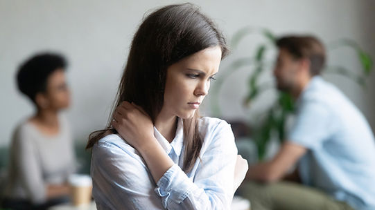A young adult looking discouraged dealing with her chronic pain. Marble Wellness has Chronic Illness Therapists who specialize in helping those suffering with Chronic Pain. Marble Wellness is located in St. Louis, MO.