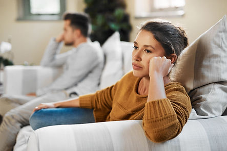 Two people in a relationship not very happy. Marble Wellness offers counseling in Chicago for breakups or relationships. 