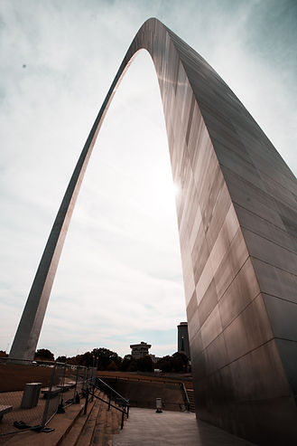 Looking up at the Arch in Saint Louis, Missouri. The Arch is a date spot recommended by a therapist near me at Marble Wellness in Ballwin, MO 63011.
