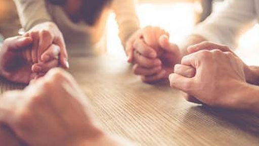 A picture of people holding hands in support of grief. Marble Wellness offers Grief Counseling both in person or virtually. Marble Wellness is located in STL and even offers walk and talk grief therapy. 