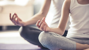 Two people meditating. Meditation can be a great habit and resource for an anxious mom. For anxious moms in Missouri or Illinois who are looking for additional help to overcome general anxiety or postpartum anxiety, we are here to help!