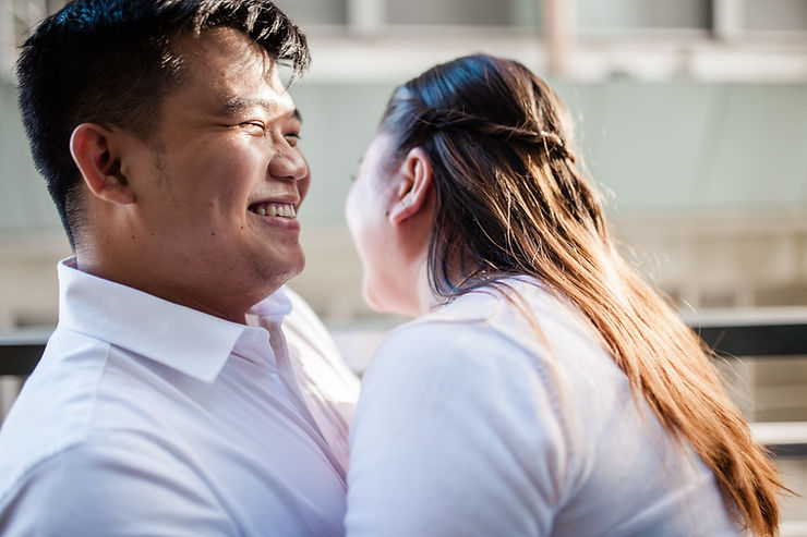 Happy couple laughing with each other. Couples counseling at Marble Wellness can help you with communication tips to boost your relationship, and other strategies to have a positive partnership.