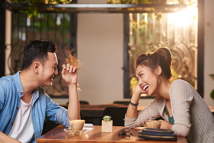Couple enjoying each other's company over coffee. Marble Wellness has relationship counseling for one and couples counseling in St. Louis, MO. We offer virtual sessions in MO and IL. Call today to get started!