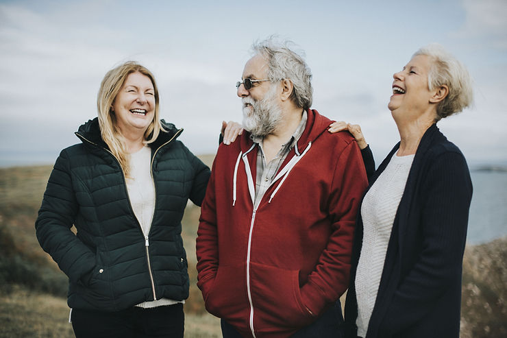 Three friends-two women and one man-enjoying each other's company. Depression can rob you of positive emotions, depression therapy in St. Louis, MO can help. Call us today!