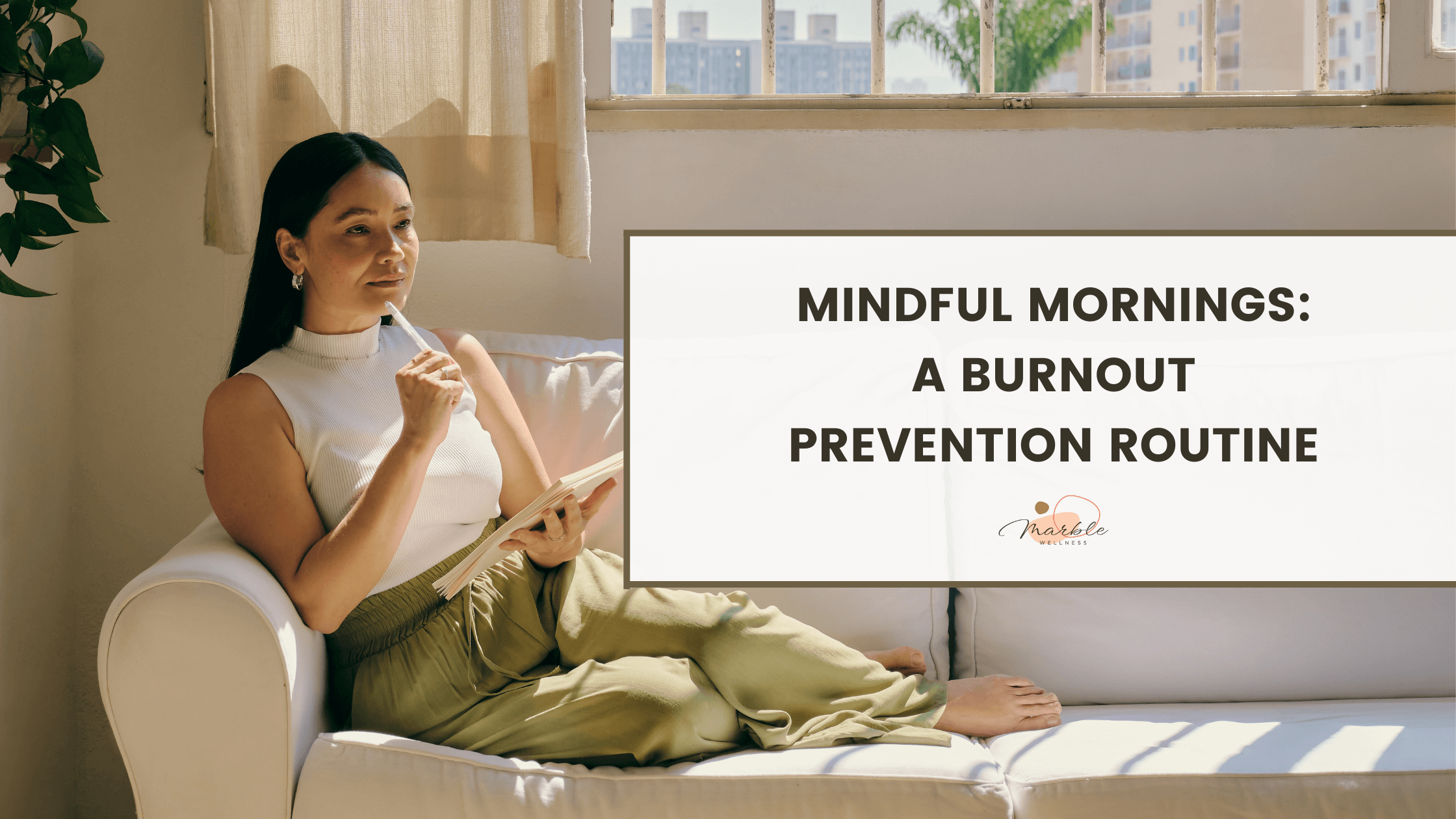 Photo of a woman sitting on her couch and starting her morning by writing on her journal. This represents how implementing some of these 7 tips for creating a mindful morning routine can help you prevent burnout.