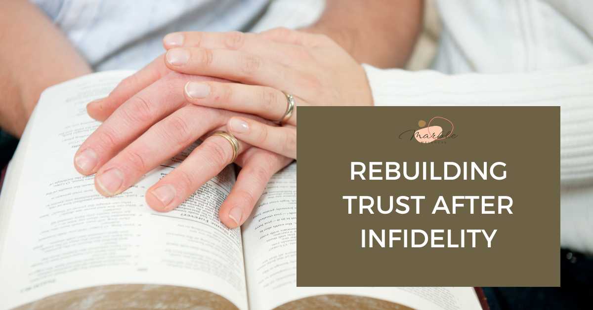 Couple holding hand over a an open bible with text "Rebuilding Trust After Infidelity" from a St. Louis, MO couples therapist.